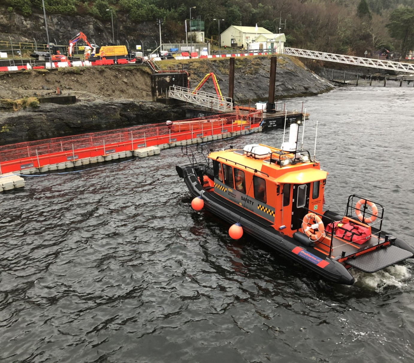 Floating Pontoon Hire modular floating pontoon with safety boat supporting river infrastructure and marine construction works in fast-flowing tidal conditions